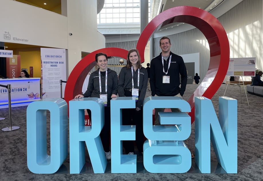 Teresa Kline, Hayley Carter, and Kyle Crane at the 2024 American Evaluation Association Conference in Portland, Oregon